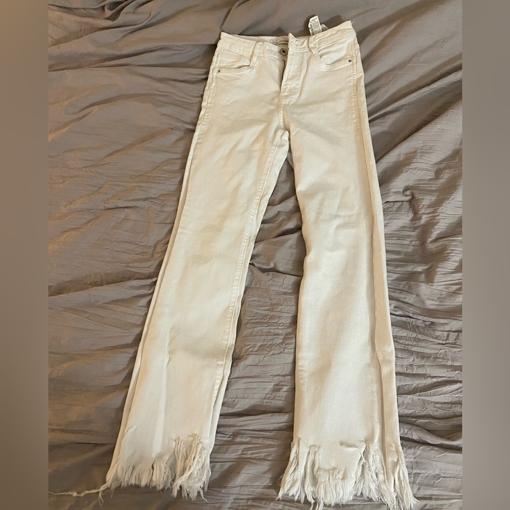 Women’s white denim frayed edge jeans
